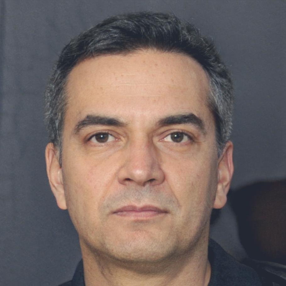 Male yoga instructor with calm expression